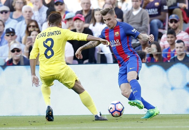 Люка Динь (справа), fcbarcelona.com